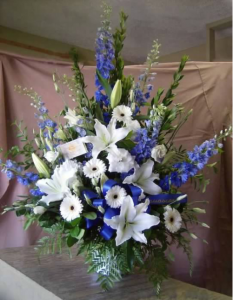 Traditional Tribute with Delphinium, Oriental Lilies, Large Gerbera Dasiy and Roses