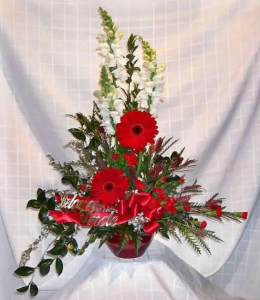Tableside Tribute with Snapdragons, Large Gerbera Daisy, Miniature Carnations and Sterling Range
