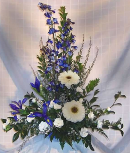 Tableside Tribute with Delphinium, Large Gerbera Daisy, Iris, Miniature Carnations and Sterling Range