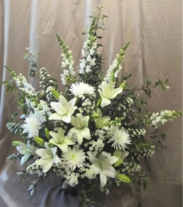 Traditional Tribute with Snapdragons, Fuji Mums, Asiatic Lilies, and Monte Cassino