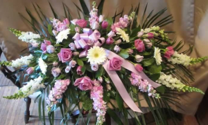 Casket Spray with Snapdragons, Stock, Large Gerbera Daisy, Large and Spray Roses, and Tulips