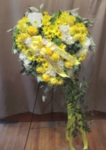 Solid Floral Heart with Bells of Ireland, Pom Mums, Hydrangea, and Roses