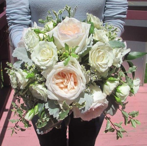 Ivory Garden Rose bouquet accented with Roses and mixed greens