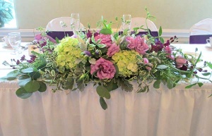 Hydrangea and Lisianthus Head Table Piece with Mixed Greens