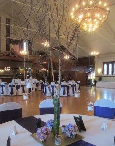 Birch Branch Centerpiece with Hanging Candles and Purple Hydrangea Tufts 