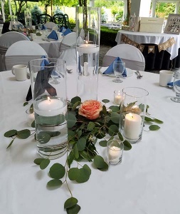 Bed of Greens Centerpiece with Peach Rose