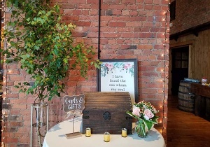 Gift Table with Pink Rose Vase Arrangement and Birch Branch Stands 