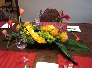 Modern Dinner Party Centerpiece with Roses, Protia, Calla Lilies, Hydrangea and greens